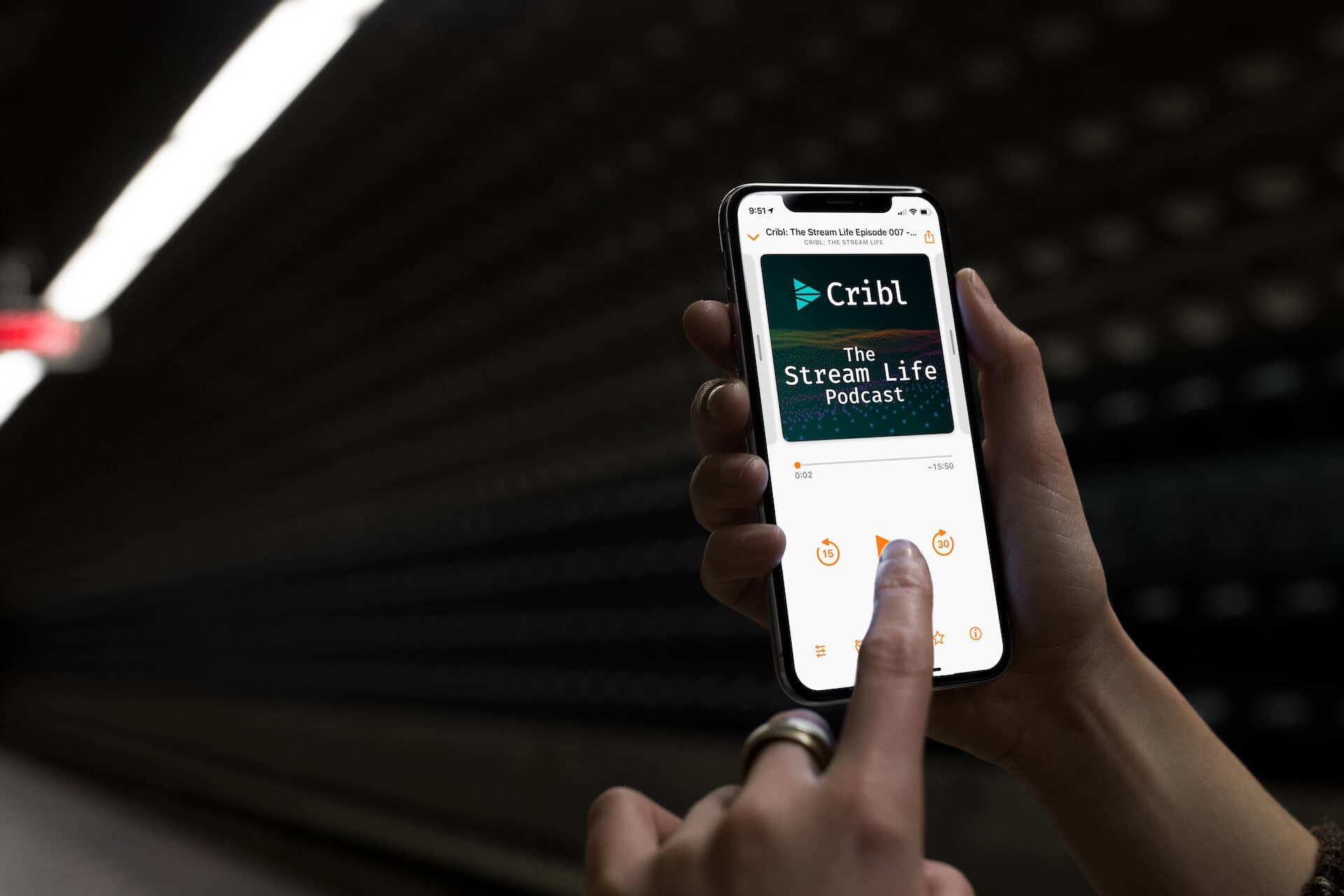 woman-with-iphone-x-mockup-in-underground-station